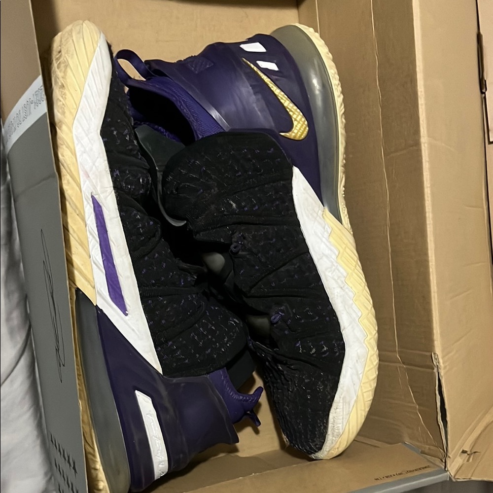 Nike Black and Purple Athletic Shoes with Gold Details